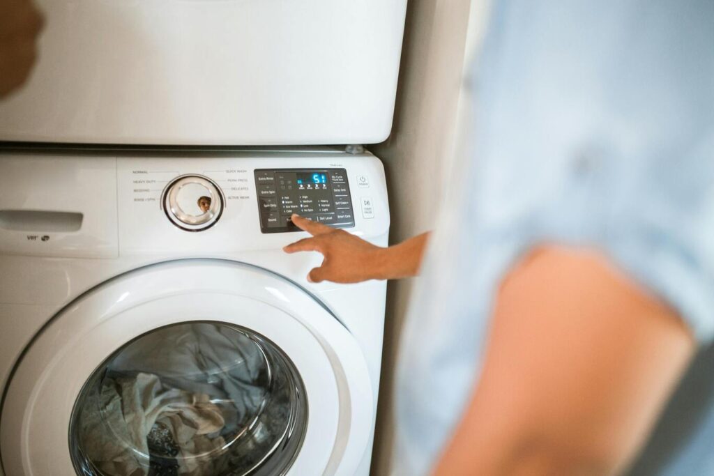 how to get fiberglass out of clothes using washing machine
