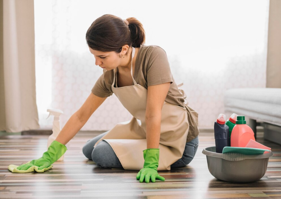 girl cleaning wood floor