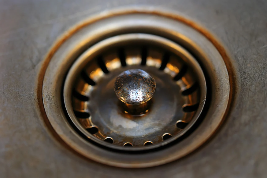 orange stains in shower drain